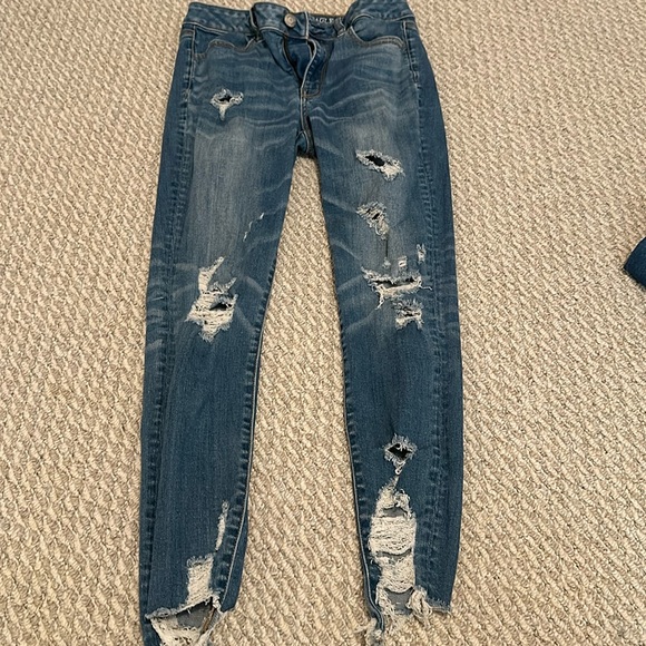 American Eagle Outfitters Denim - Women American eagle high rise jegging sz 8 w rips blue